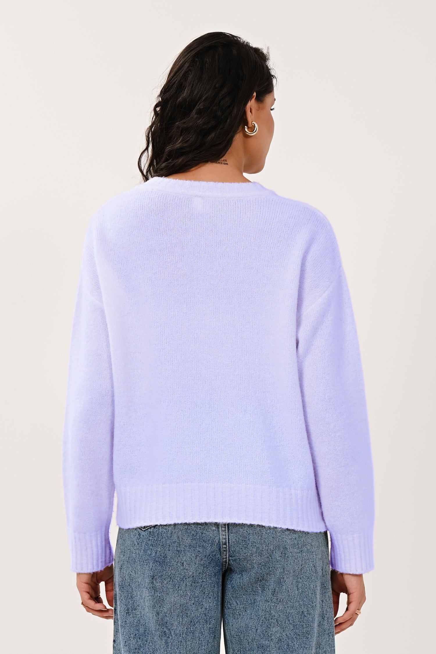 Back view showing the design of the women's lilac jumper