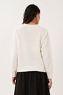 Back view showing the design of the women's ivory jumper