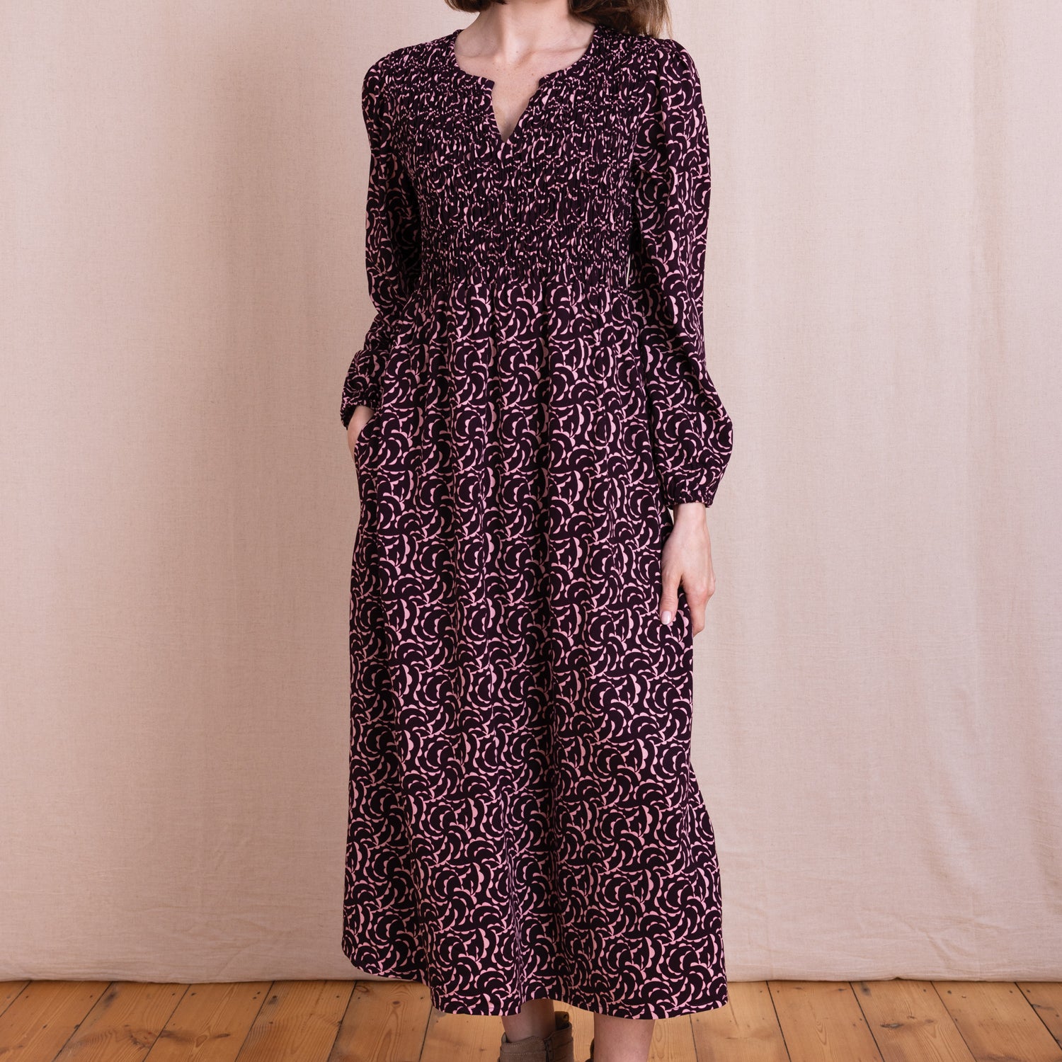 Burgundy printed smocked midi dress in 100% viscose twill by Nomads Clothing.