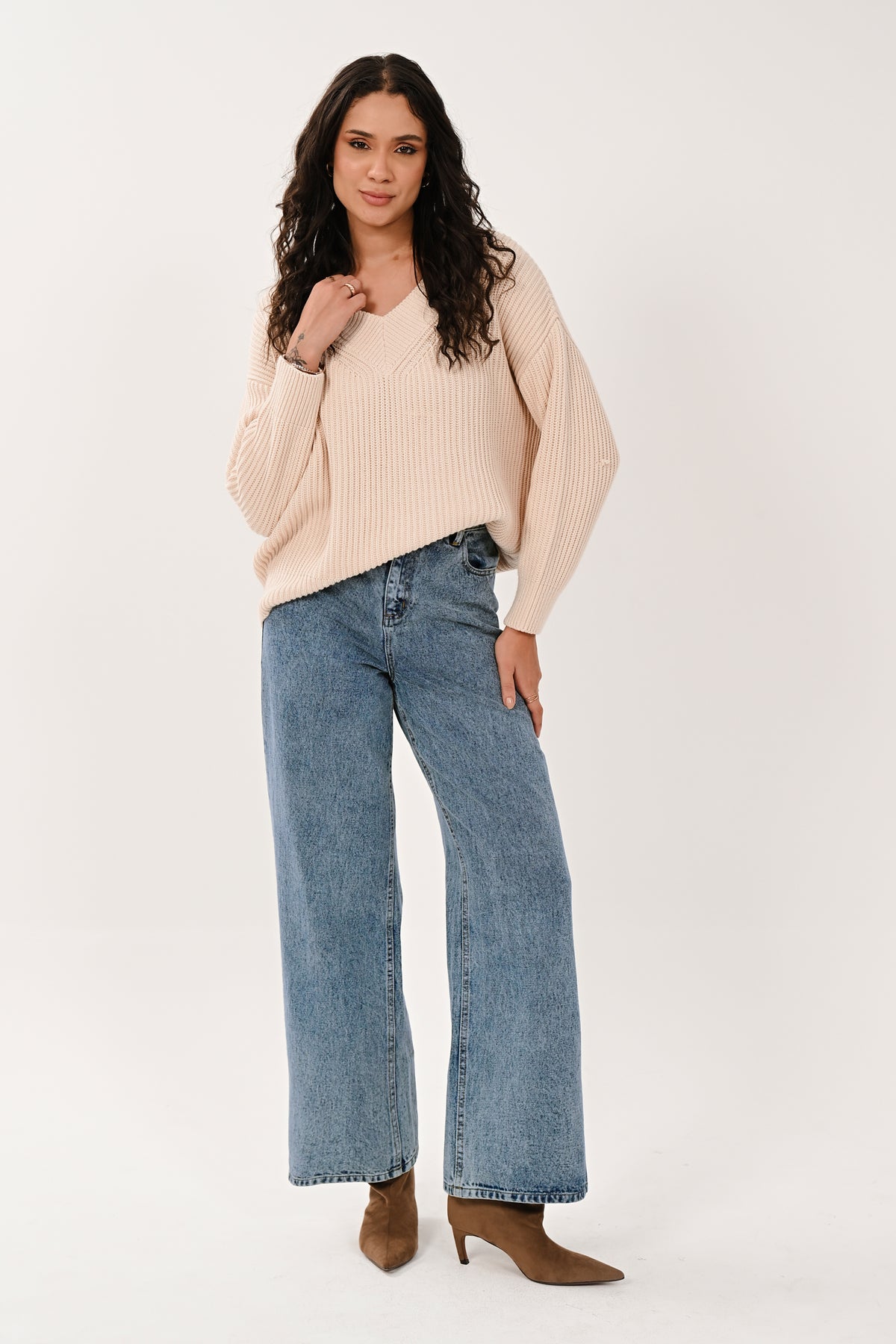 Full-length view of the blue wide leg denim jeans