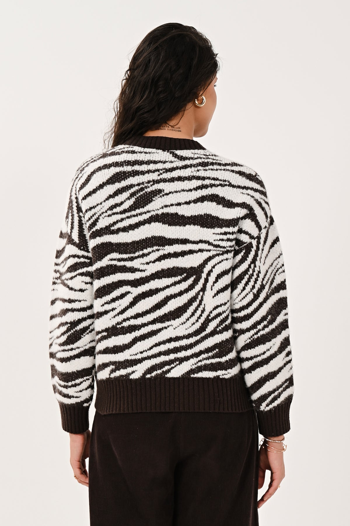Back view showing the design of the women's chocolate jumper