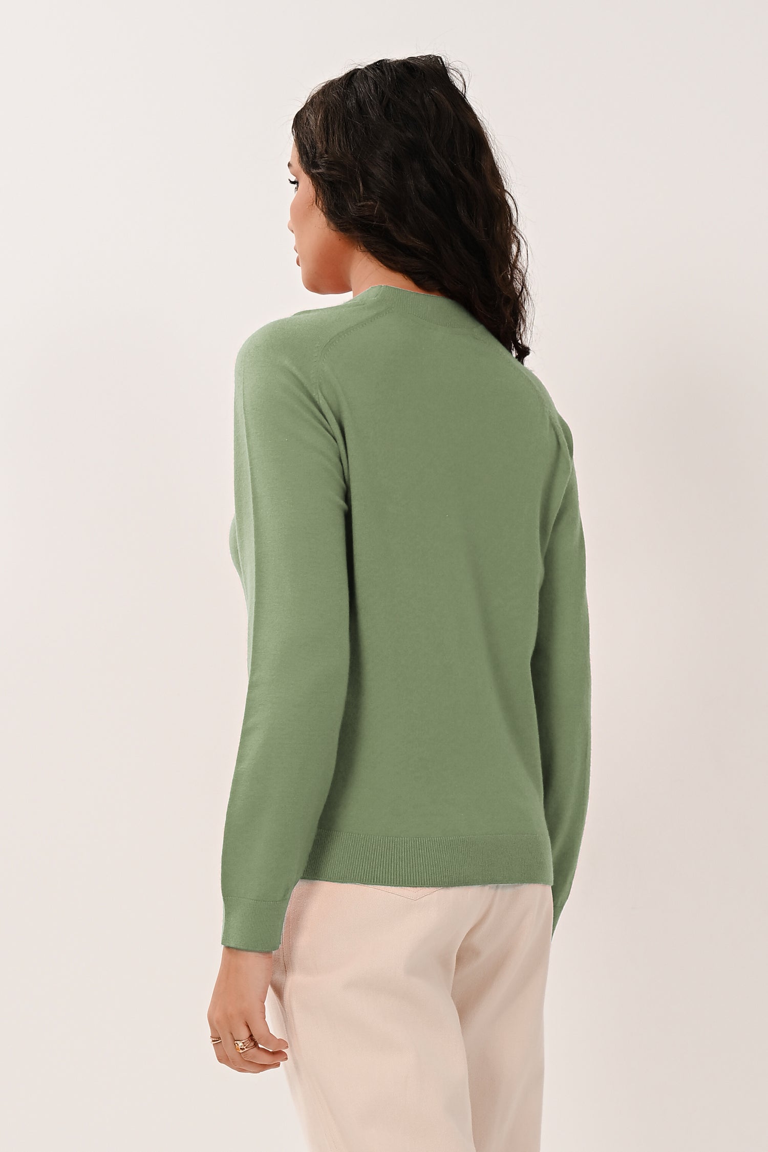 Back view of the sage saddle shoulder jumper showing its knit design