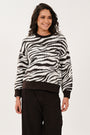 Women's chocolate crew neck jumper styled for a versatile seasonal outfit